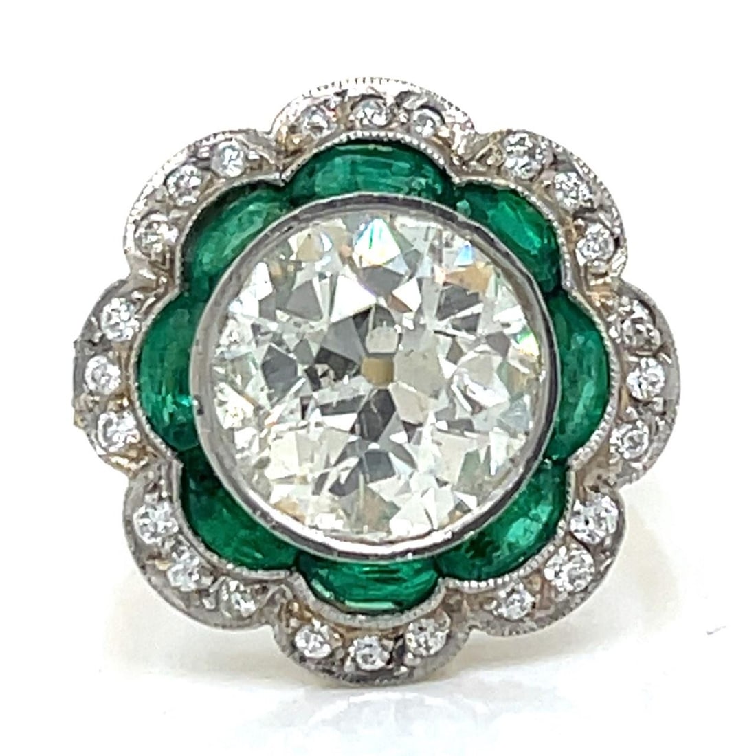 Art Deco Platinum 18K Gold Diamond Emerald Ring 4.03 Ct: Art Deco Platinum 18K Gold Diamond Emerald Ring 4.03 Ct This exquisite Art Deco ring features a stunning combination of platinum and 18K yellow gold. At its center lies a 4.03 Ct. European-cut diamond