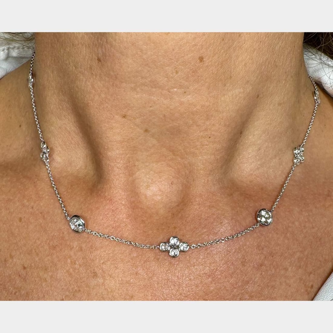 18K White Gold 5.40 Ct Diamond by the Yard Necklace: 18K White Gold 5.40 Ct Diamond by the Yard Necklace This exquisite 18K White Gold necklace features a stunning design known as 'Diamond by the Yard'. It showcases 30 diamonds with an approximate total