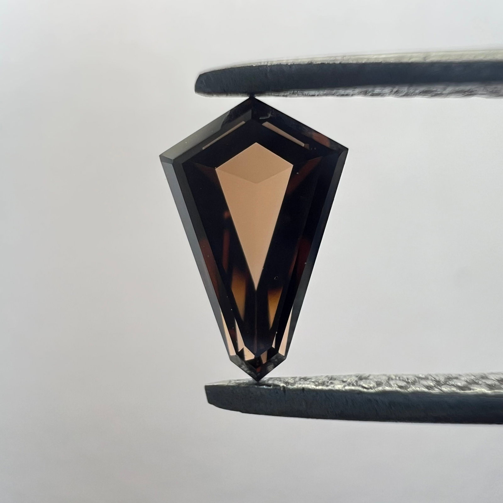 Loose Diamond - KITE 0.48ct Brown VVS2: Loose Diamond - KITE 0.48ct Brown VVS2 Source: This is a real non-mined Diamond that has been grown in a lab Shape: KITE Carats: 0.48 Color: Brown Certification: NONE PLEASE NOTE: Framed, Large, or he