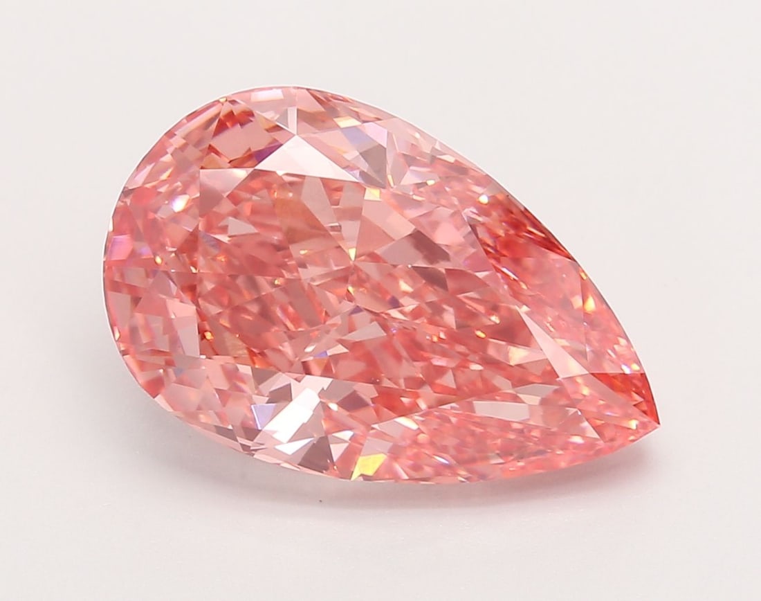 Loose Diamond - PEAR 7.19ct Fancy Vivid Pink VVS2: Loose Diamond - PEAR 7.19ct Fancy Vivid Pink VVS2 Source: This is a real non-mined Diamond that has been grown in a lab Shape: PEAR Carats: 7.19 Color: Fancy Vivid Pink Certification: IGI Video: