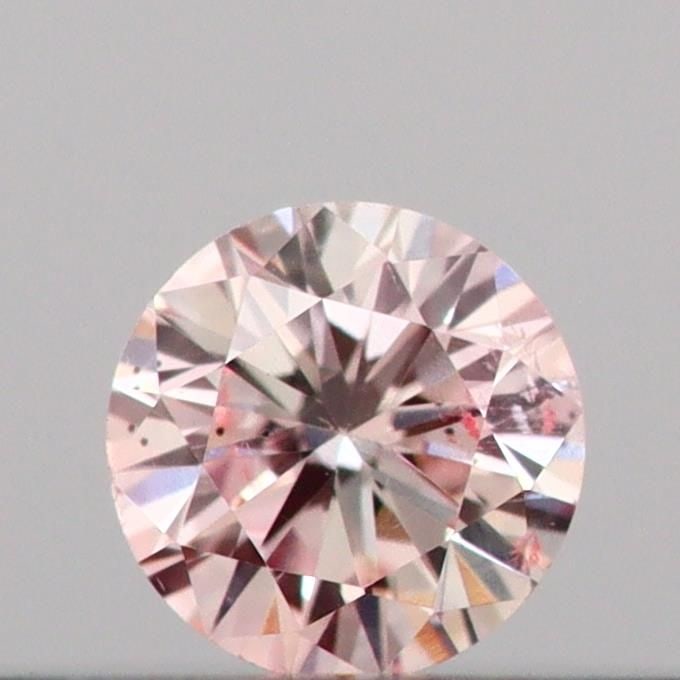Loose Diamond - ROUND 0.1ct Fancy Light Pink I1: Loose Diamond - ROUND 0.1ct Fancy Light Pink I1 Source: This is a real non-mined Diamond that has been grown in a lab Shape: ROUND Carats: 0.1 Color: Fancy Light Pink Certification: IGI Video: