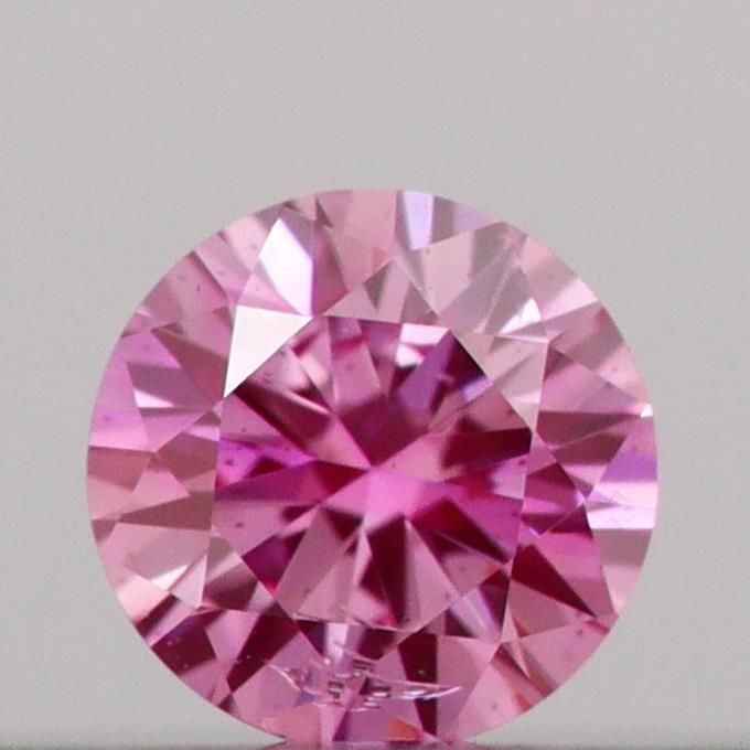 Loose Diamond - ROUND 0.09ct Fancy Vivid Pink SI1: Loose Diamond - ROUND 0.09ct Fancy Vivid Pink SI1 Source: This is a real non-mined Diamond that has been grown in a lab Shape: ROUND Carats: 0.09 Color: Fancy Vivid Pink Certification: IGI Video: