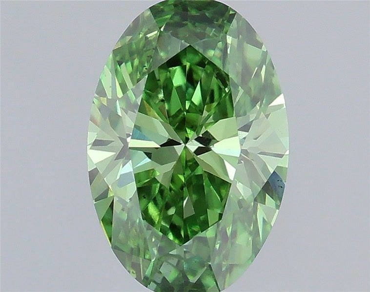 Loose Diamond - OVAL 0.84ct Fancy Vivid Green VS2: Loose Diamond - OVAL 0.84ct Fancy Vivid Green VS2 Source: This is a real non-mined Diamond that has been grown in a lab Shape: OVAL Carats: 0.84 Color: Fancy Vivid Green Certification: IGI Video: