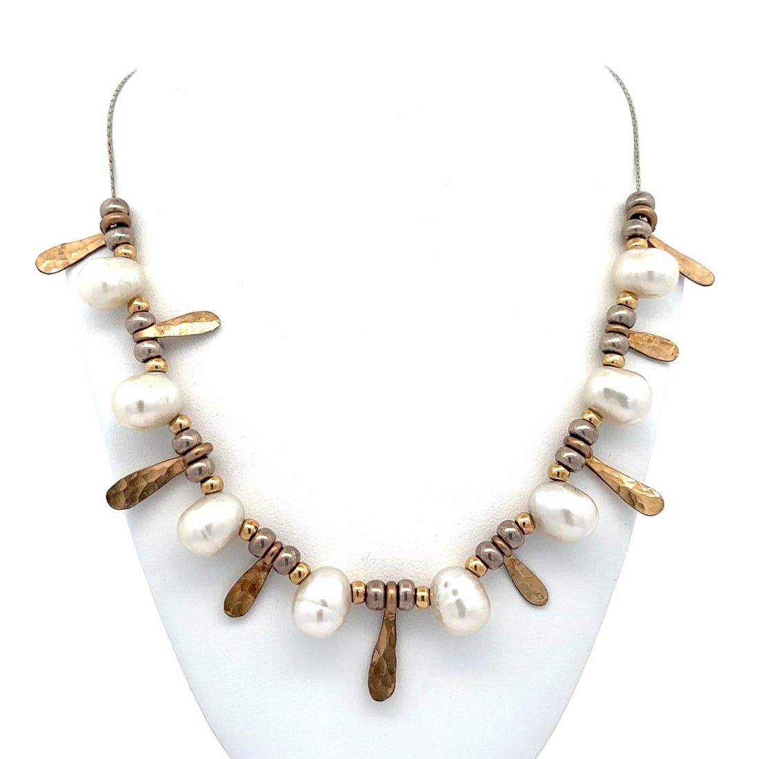 Baroque Pearl Yellow Gold Filled Fringe Necklace 16.5in: Baroque Pearl Yellow Gold Filled Fringe Necklace 16.5in This exquisite necklace features a stunning combination of natural baroque pearls and a unique hammered leaf fringe design. Made with a base of 