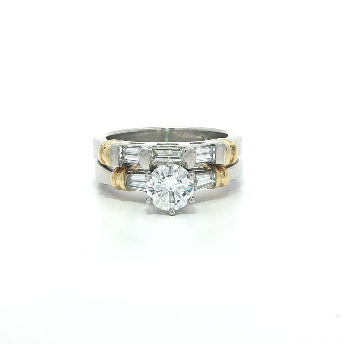 GIA Certified 1.53ct Diamond Platinum Yellow Gold Engagement and Wedding Ring Set: GIA Certified 1.53ct Diamond Platinum Yellow Gold Engagement and Wedding Ring Set This engagement and wedding band set features a natural round brilliant cut diamond certified by GIA as F color and SI
