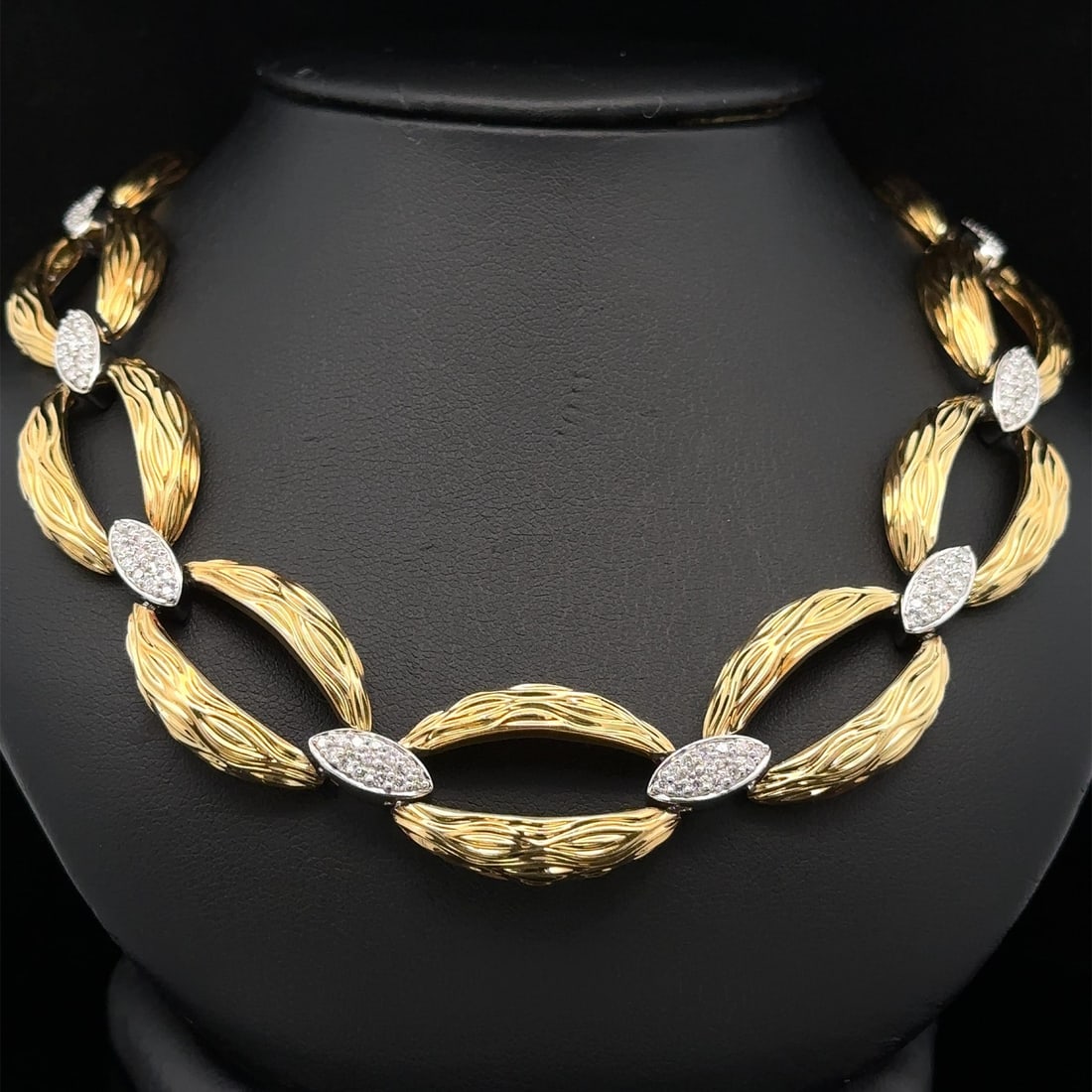 Diamond Marquise Link Necklace in 18k Yellow Gold with Wavy Textured Design 1ctw: Diamond Marquise Link Necklace in 18k Yellow Gold with Wavy Textured Design 1ctw This necklace features a wavy pattern with textured open marquise-shaped links crafted from solid 18k yellow and white 