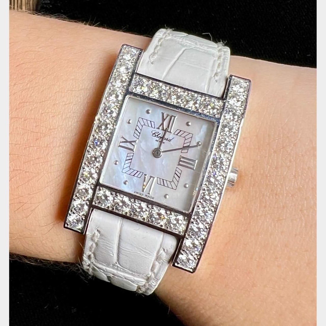 Chopard 18K White Gold Mother of Pearl Diamond H Watch: Chopard 18K White Gold Mother of Pearl Diamond H Watch Discover the elegant Chopard 18K White Gold Watch featuring a stunning Mother of Pearl dial and adorned with 34 original diamonds, approximately 