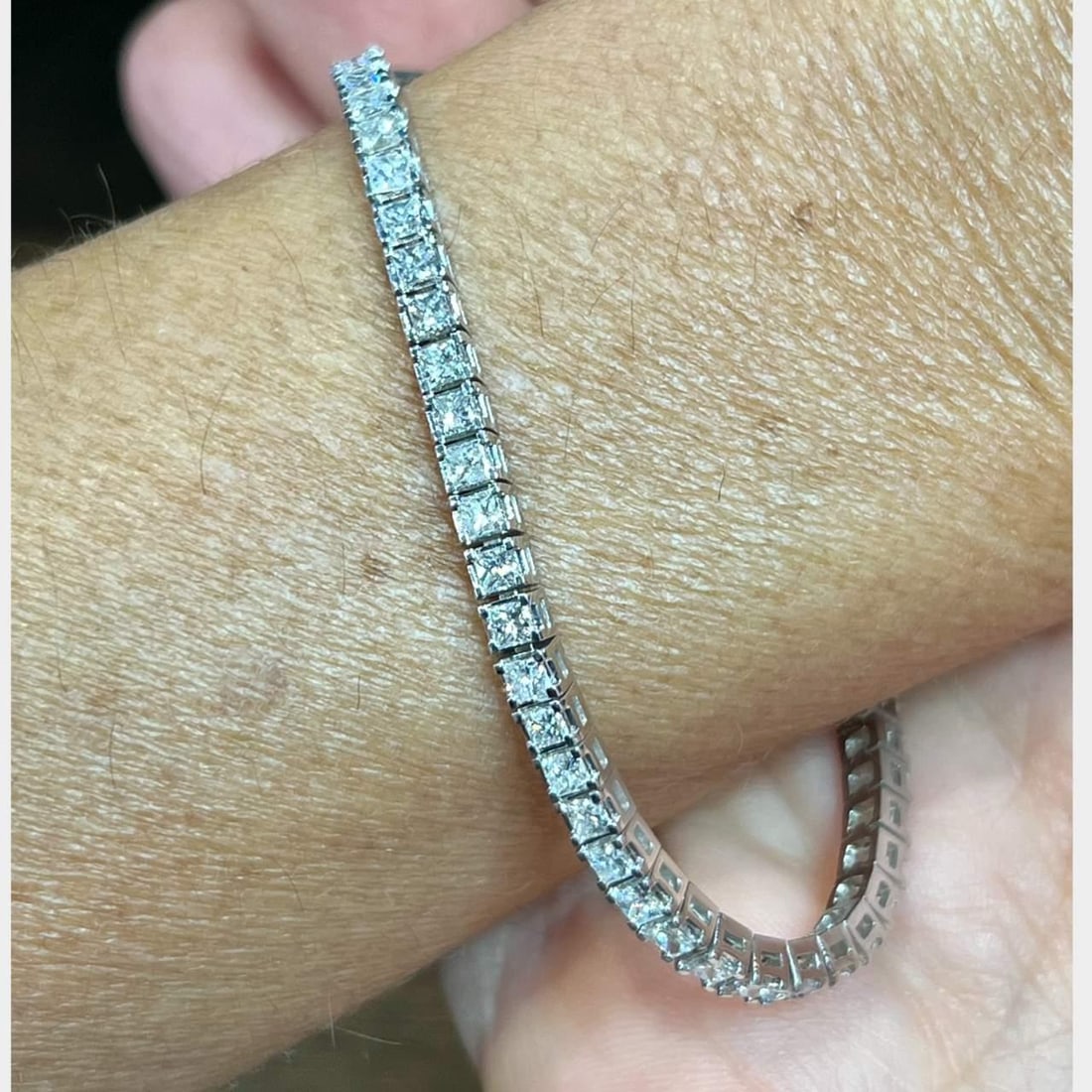 14K White Gold 6.50 Ct Diamond Tennis Bracelet with 60 Princess Cuts: 14K White Gold 6.50 Ct Diamond Tennis Bracelet with 60 Princess Cuts This exquisite 14K White Gold Tennis Bracelet features a stunning array of 60 princess-cut diamonds, totaling approximately 6.50 ca