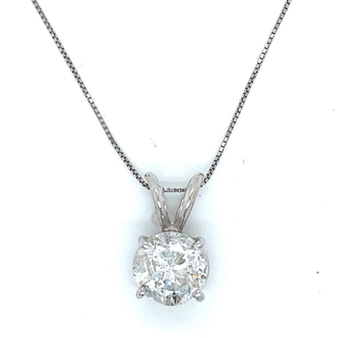 Elegant 14K White Gold Necklace with 2.67 Ct Diamond: Elegant 14K White Gold Necklace with 2.67 Ct Diamond This stunning 14K white gold necklace features a dazzling 2.67 Ct. diamond, boasting F-G color and I2 clarity. The delicate chain measures 18 inche