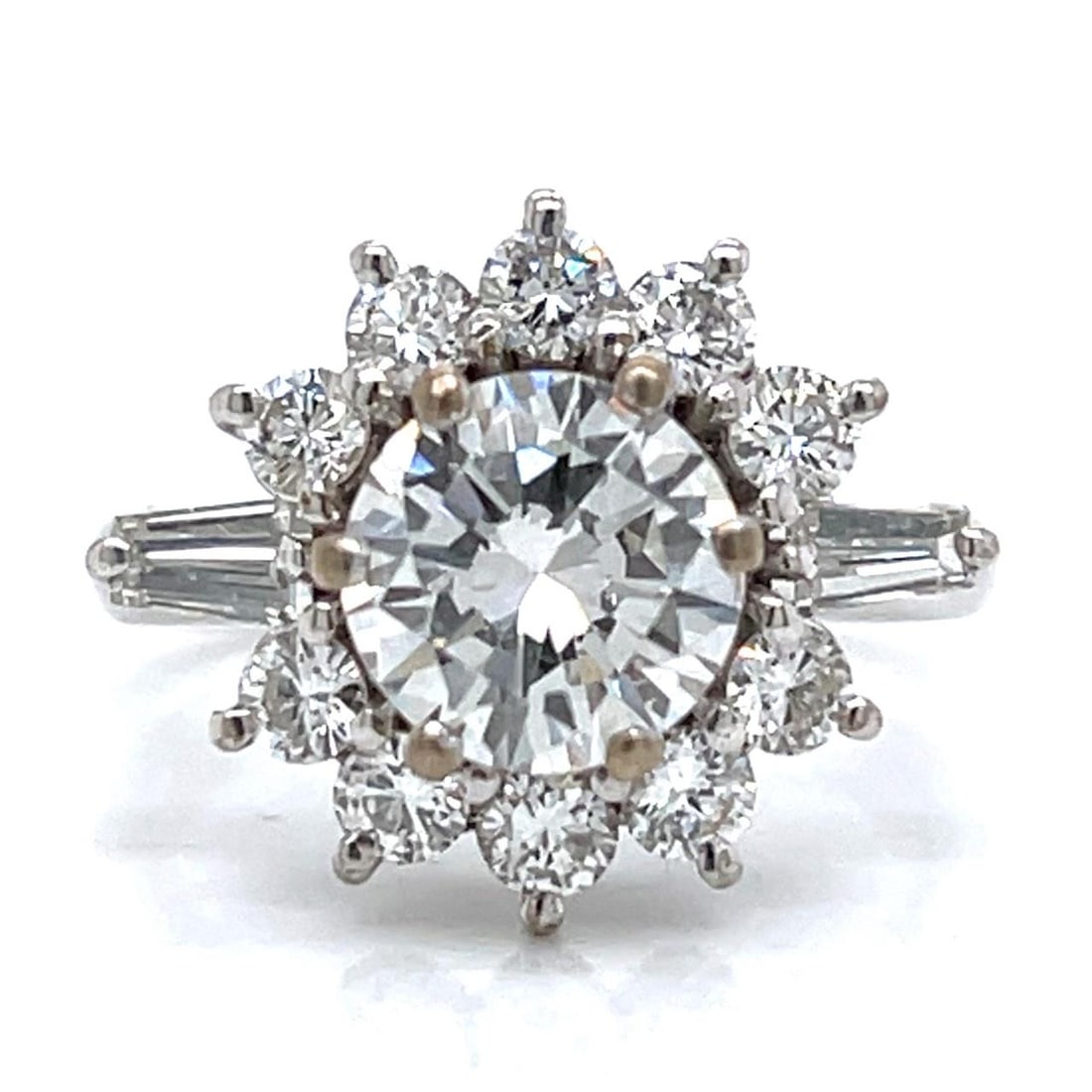 French 18K White Gold Diamond Ring 3.46 Ct Total Weight: French 18K White Gold Diamond Ring 3.46 Ct Total Weight This stunning French ring is crafted from 18K white gold and features a total diamond weight of 3.46 carats. The centerpiece is a magnificent 1.