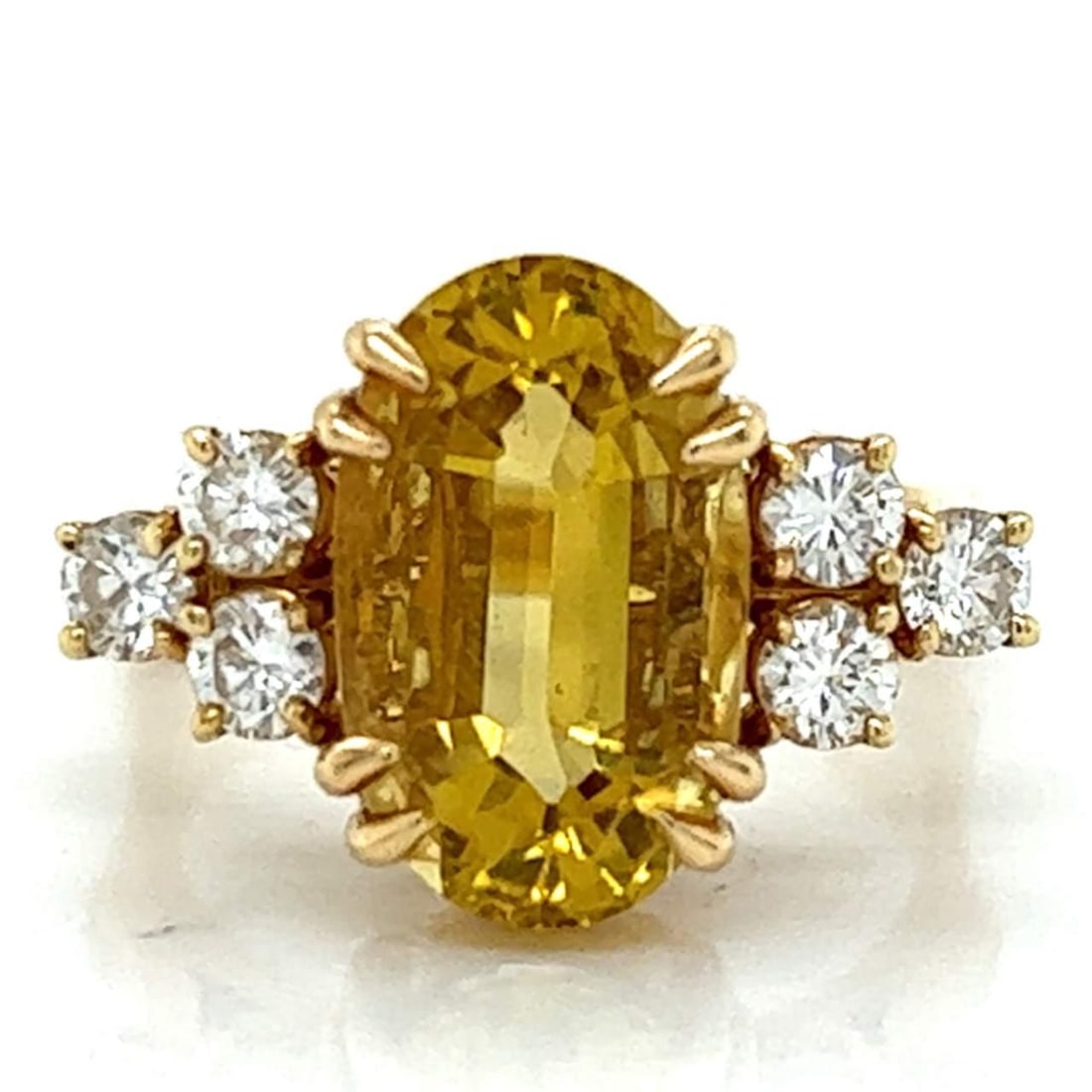 18K Yellow Gold Ring with 7.00 Ct Golden Beryl and 6 Diamonds: 18K Yellow Gold Ring with 7.00 Ct Golden Beryl and 6 Diamonds This exquisite 18K Yellow Gold ring features a stunning centerpiece of approximately 7.00 Ct. Golden Beryl, complemented by six sparkling 