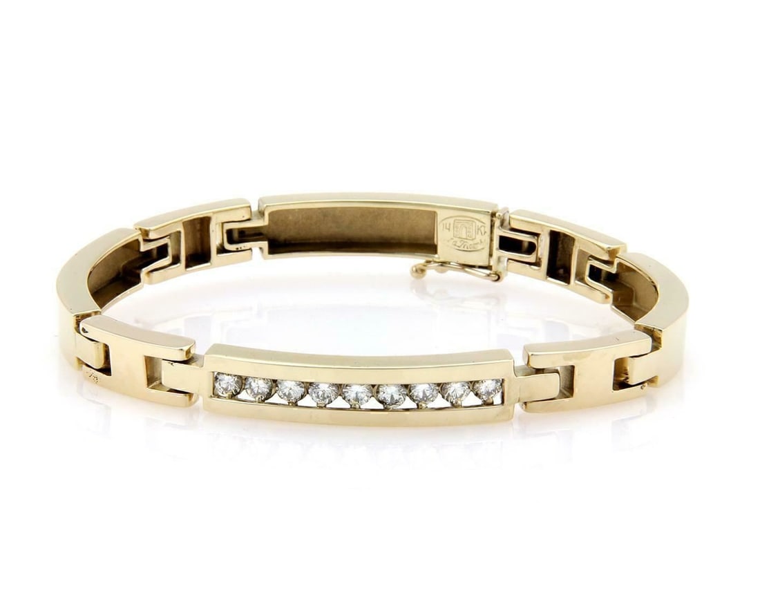 Vintage La Triomphe 14k Yellow Gold Diamond H Link Bracelet: Vintage La Triomphe 14k Yellow Gold Diamond H Link Bracelet This vintage La Triomphe bracelet is crafted in 14k yellow gold and features a distinctive curved bar and H-link design. Accented with appro