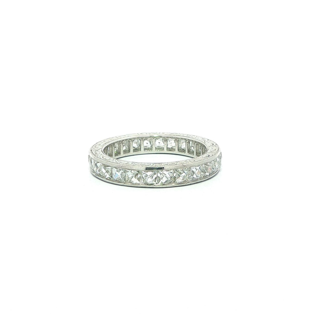 Platinum French Cut Diamond Eternity Band Ring Size 6: Platinum French Cut Diamond Eternity Band Ring Size 6 This vintage eternity band features 16 natural French cut diamonds with a total carat weight of approximately 3.33 carats. The diamonds are channe