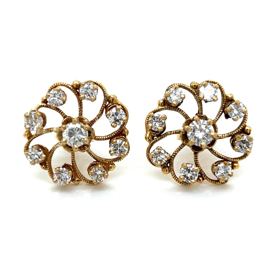 Diamond Earrings in 14K Yellow Gold with 1.60 Ct Total Weight: Diamond Earrings in 14K Yellow Gold with 1.60 Ct Total Weight Elegant 14K yellow gold earrings featuring a total of 18 diamonds with an approximate combined weight of 1.60 carats. The diamonds are gra