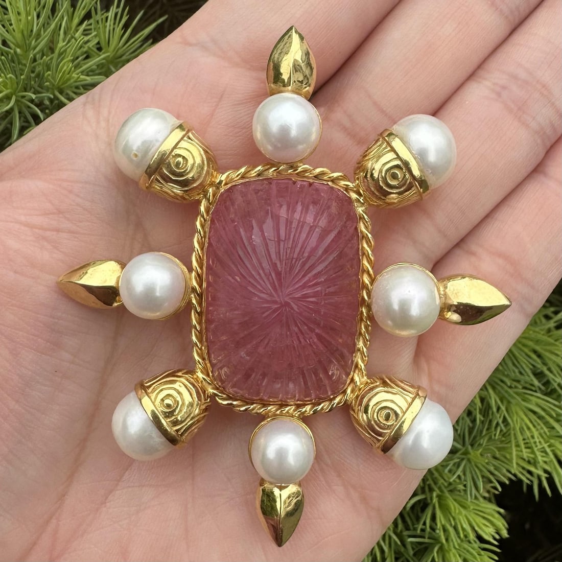 18k Yellow Gold Brooch with Pink Tourmaline and Pearls: 18k Yellow Gold Brooch with Pink Tourmaline and Pearls This vintage brooch features a large, custom-carved natural pink tourmaline set in solid 18k yellow gold, complemented by eight genuine cultured 