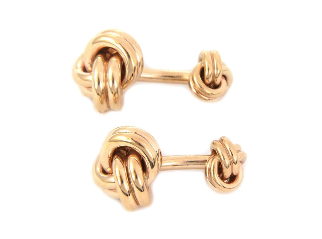 Tiffany & Co. 14k Yellow Gold Love Knot Cufflinks Authentic: Tiffany & Co. 14k Yellow Gold Love Knot Cufflinks Authentic Elevate your style with this authentic pair of cufflinks from the Love Knot Collection by Tiffany & Co. Crafted from luxurious 14k yellow go