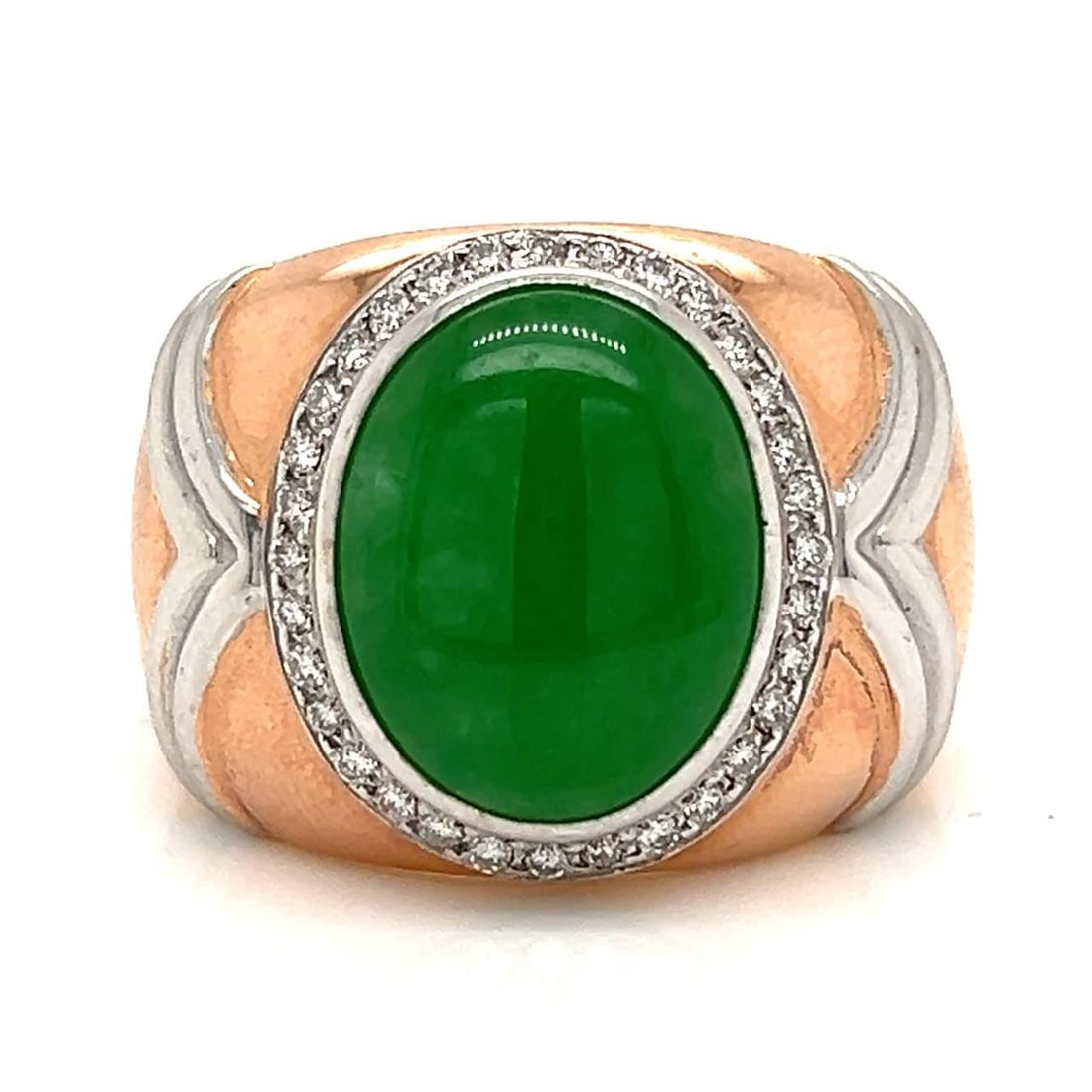 9K Rose Gold GIA Certified Jade Ring GIA #5202699971: 9K Rose Gold GIA Certified Jade Ring GIA #5202699971 This exquisite 9K Rose Gold ring showcases a stunning GIA Certified jade centerpiece, elegantly crafted to enhance its natural beauty. Weighing 13.