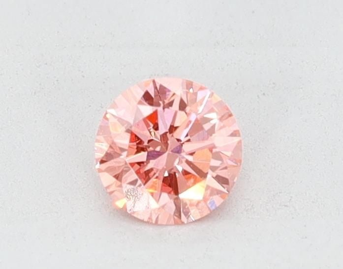 Loose Diamond - ROUND 0.31ct Pink SI1: Loose Diamond - ROUND 0.31ct Pink SI1 Source: This is a real non-mined Diamond that has been grown in a lab Shape: ROUND Carats: 0.31 Color: Pink Certification: NONE Video: