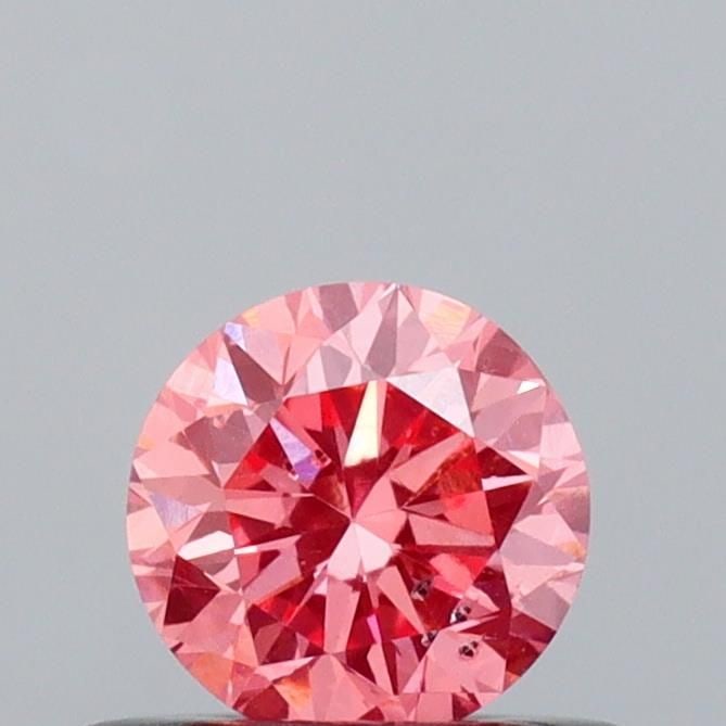 Loose Diamond - ROUND 0.41ct Fancy Vivid Pink SI1: Loose Diamond - ROUND 0.41ct Fancy Vivid Pink SI1 Source: This is a real non-mined Diamond that has been grown in a lab Shape: ROUND Carats: 0.41 Color: Fancy Vivid Pink Certification: IGI Video: