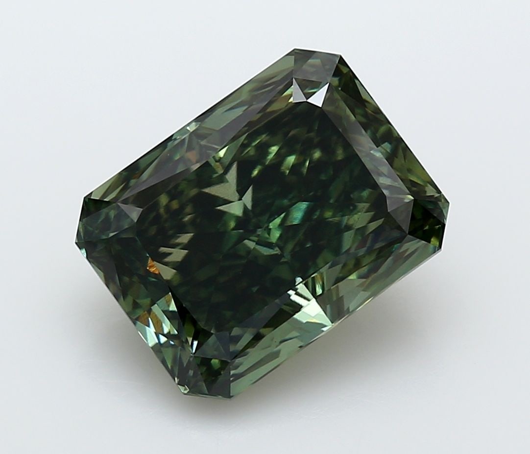 Loose Diamond - RADIANT 7.4ct Fancy Deep Green VS2: Loose Diamond - RADIANT 7.4ct Fancy Deep Green VS2 Source: This is a real non-mined Diamond that has been grown in a lab Shape: RADIANT Carats: 7.4 Color: Fancy Deep Green Certification: IGI Video: