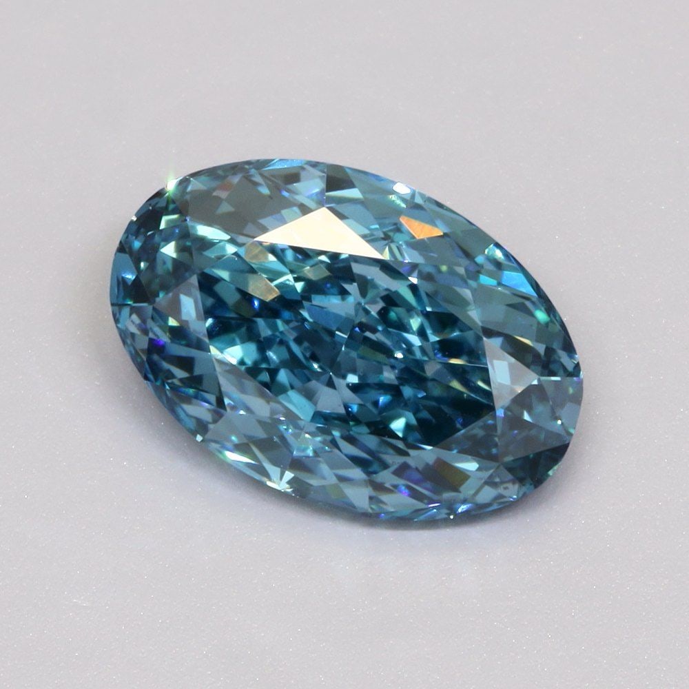 Loose Diamond - OVAL 3.04ct Fancy Vivid Blue VS1: Loose Diamond - OVAL 3.04ct Fancy Vivid Blue VS1 Source: This is a real non-mined Diamond that has been grown in a lab Shape: OVAL Carats: 3.04 Color: Fancy Vivid Blue Certification: IGI Video: