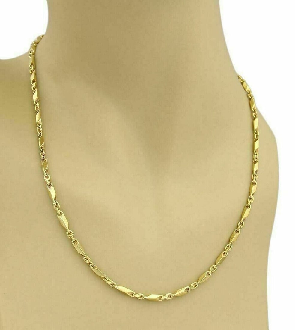 Vintage 24k Gold Oval Bar Link Necklace: Vintage 24k Gold Oval Bar Link Necklace This vintage chain necklace is crafted from solid 24k gold and features an elongated oval bar link design. With a refined, streamlined silhouette, it offers a t