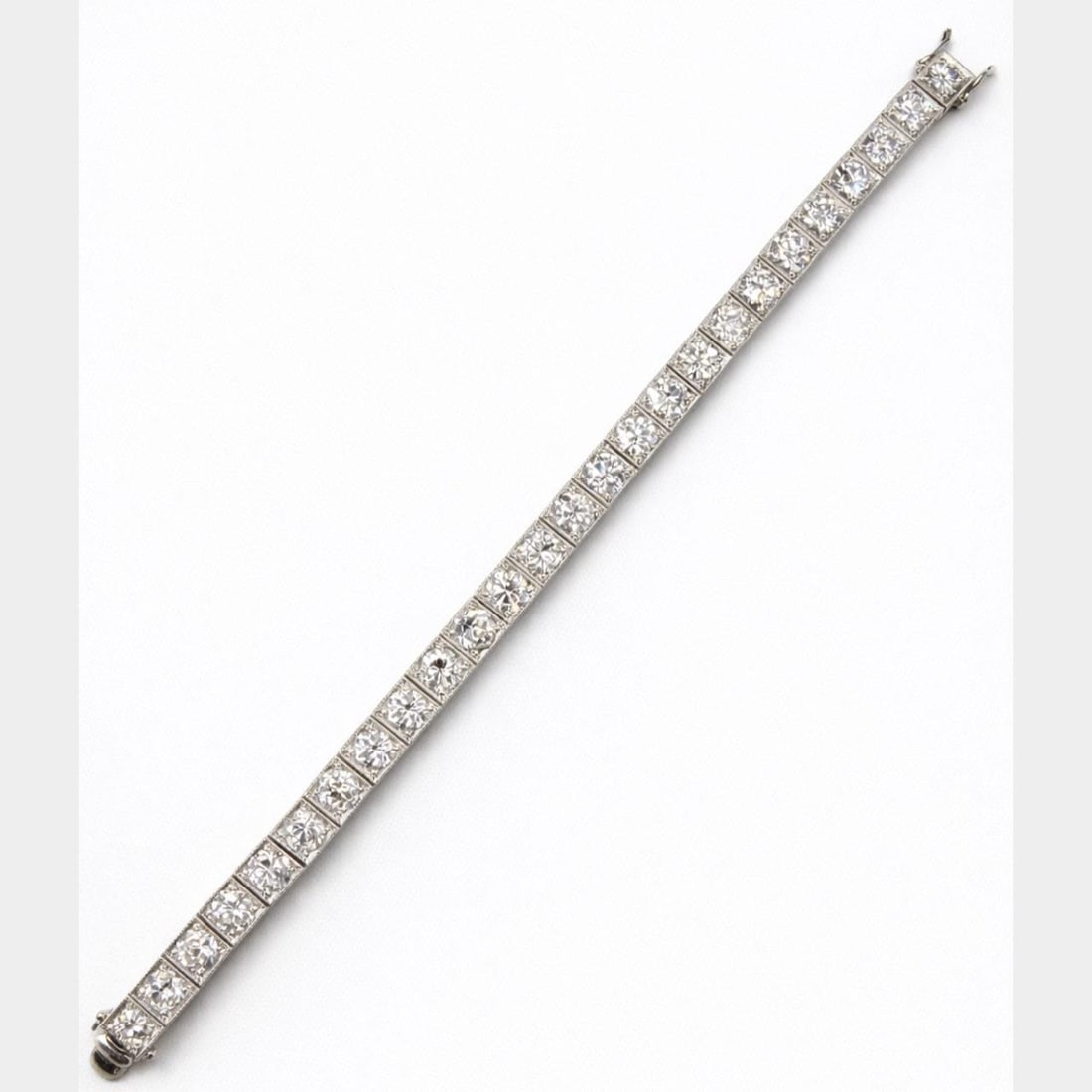 Diamond Tennis Bracelet in Platinum with 15 Carats European Cut 7.25 Inch: Diamond Tennis Bracelet in Platinum with 15 Carats European Cut 7.25 Inch This platinum tennis bracelet features 30 European-cut diamonds with an approximate total weight of 15.00 carats. The diamonds