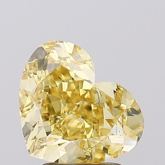 Loose Diamond - HEART 3.01ct Fancy Intense Yellow VVS2: Loose Diamond - HEART 3.01ct Fancy Intense Yellow VVS2 Source: This is a real non-mined Diamond that has been grown in a lab Shape: HEART Carats: 3.01 Color: Fancy Intense Yellow Certification: IGI Vi