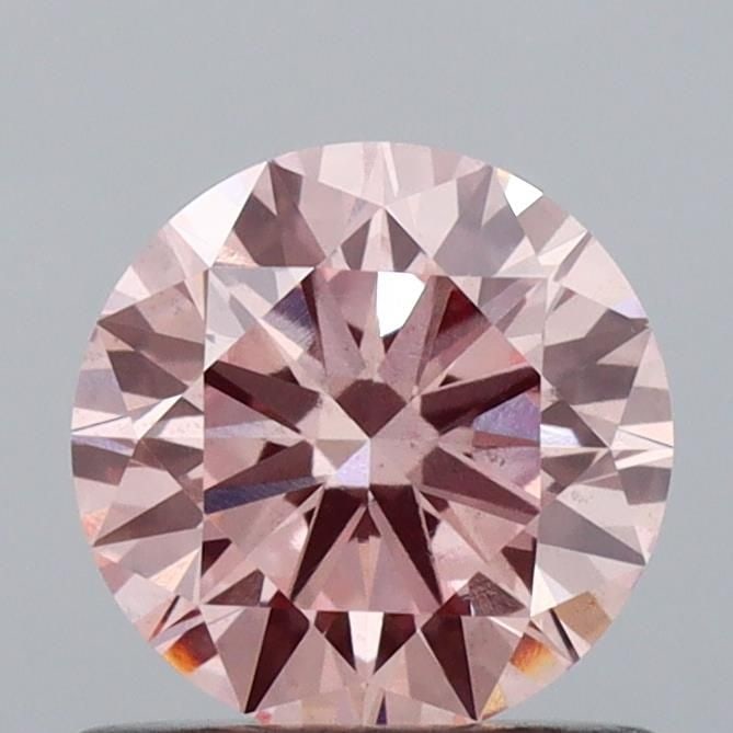 Loose Diamond - ROUND 0.77ct Fancy Intense Pink VS2: Loose Diamond - ROUND 0.77ct Fancy Intense Pink VS2 Source: This is a real non-mined Diamond that has been grown in a lab Shape: ROUND Carats: 0.77 Color: Fancy Intense Pink Certification: IGI Video: