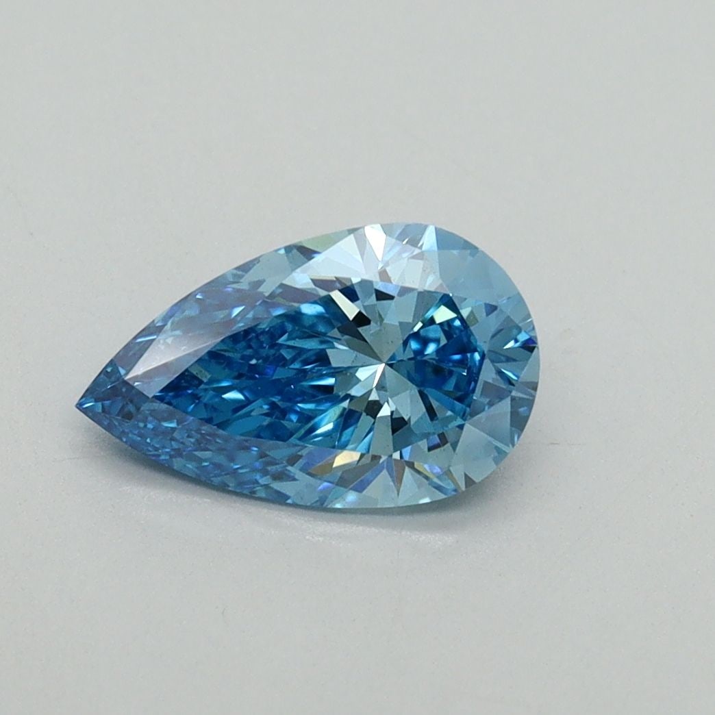 Loose Diamond - PEAR 1.03ct Fancy Vivid Blue VS2: Loose Diamond - PEAR 1.03ct Fancy Vivid Blue VS2 Source: This is a real non-mined Diamond that has been grown in a lab Shape: PEAR Carats: 1.03 Color: Fancy Vivid Blue Certification: IGI Video: