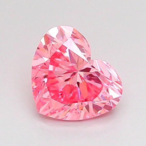 Loose Diamond - HEART 0.85ct Fancy Vivid Pink VS1: Loose Diamond - HEART 0.85ct Fancy Vivid Pink VS1 Source: This is a real non-mined Diamond that has been grown in a lab Shape: HEART Carats: 0.85 Color: Fancy Vivid Pink Certification: IGI Video: