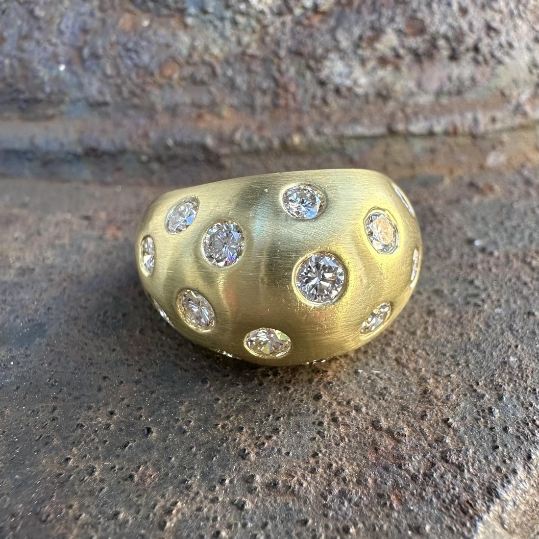 Wide Domed Band Ring in 18k Yellow Gold with 2.25ctw Round Diamonds: Wide Domed Band Ring in 18k Yellow Gold with 2.25ctw Round Diamonds This wide domed bombe band ring features 17 natural round brilliant cut diamonds, totaling approximately 2.25 carats, set in solid 1