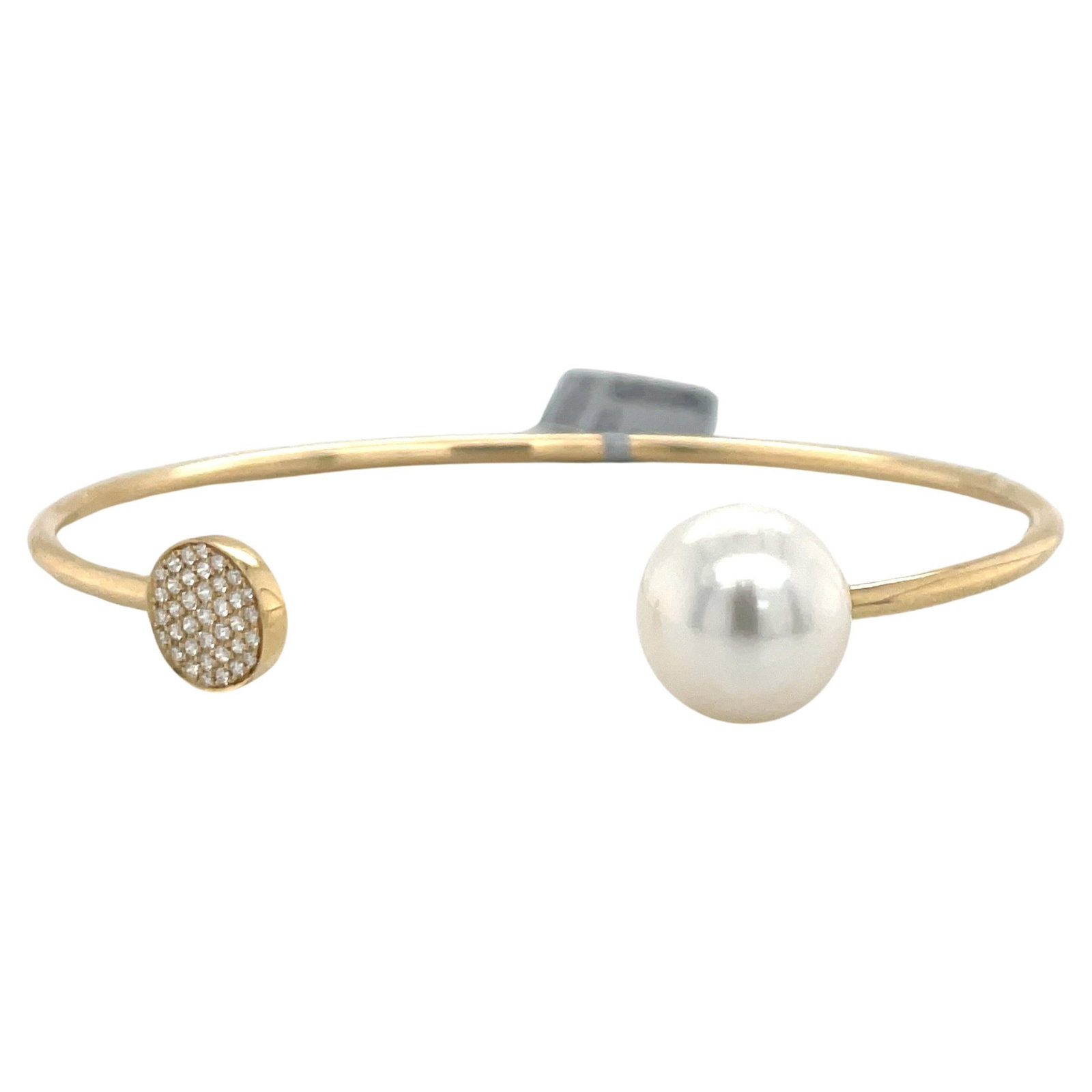 Harbor Diamonds 14K Yellow Gold Diamond South Sea Pearl Bangle 0.13ct: Harbor Diamonds 14K Yellow Gold Diamond South Sea Pearl Bangle 0.13ct This exquisite 14 Karat Yellow Gold open bangle features a contemporary design, showcasing a stunning South Sea Pearl and sparklin