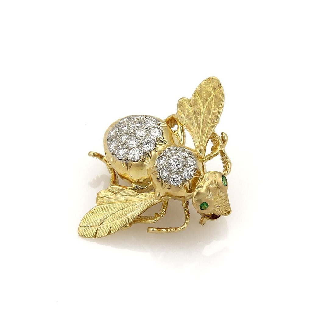 Vintage 18k Yellow Gold Bee Brooch with Diamonds and Emeralds: Vintage 18k Yellow Gold Bee Brooch with Diamonds and Emeralds This vintage bee brooch is crafted from 18k yellow gold and features a detailed, sculptural design. It is accented with natural round bril