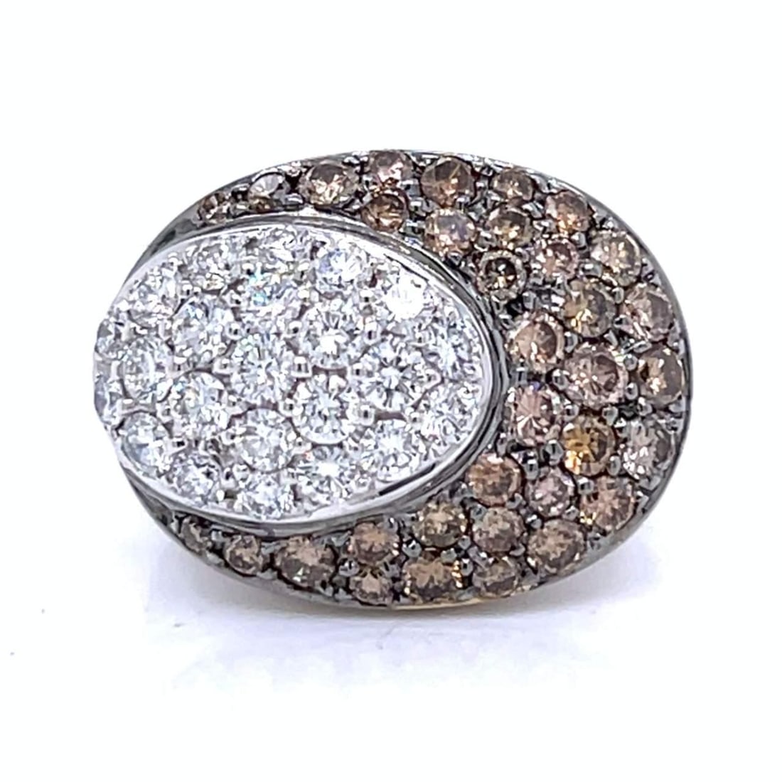 18K White Gold Ring with 57 Diamonds D-F VS Clarity: 18K White Gold Ring with 57 Diamonds D-F VS Clarity This exquisite 18K White Gold Champagne Diamond Ring showcases a stunning array of diamonds. Weighing 14.6 grams, it features 23 diamonds totaling a