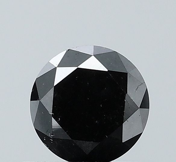Loose Diamond - ROUND 0.61ct Fancy Black VS2: Loose Diamond - ROUND 0.61ct Fancy Black VS2 Source: Natural Shape: ROUND Carats: 0.61 Color: Fancy Black Certification: NONE Video: