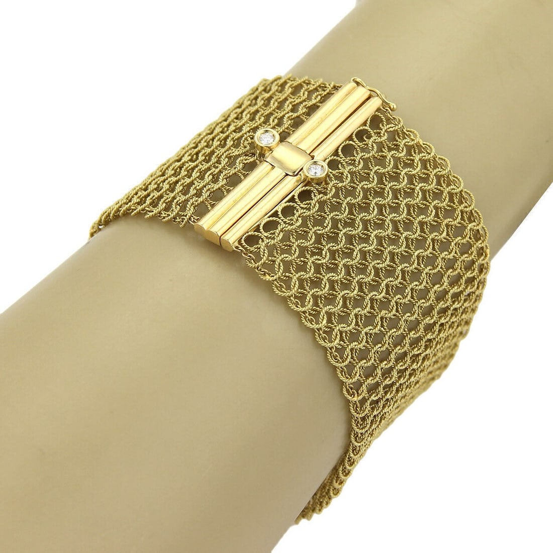 Judith Ripka 18k Yellow Gold Diamond Mesh Flex Bracelet: Judith Ripka 18k Yellow Gold Diamond Mesh Flex Bracelet This Judith Ripka wide mesh flex bracelet is crafted from 18k yellow gold and features a bold, flexible mesh design adorned with natural diamond