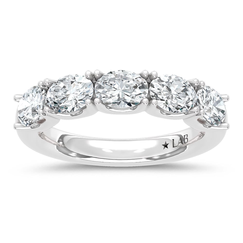 14K White Gold Lab Grown Diamond 2 Ct.Tw. Oval Shape East West Wedding Band: 14K White Gold Lab Grown Diamond 2 Ct.Tw. Oval Shape East West Wedding Band Make a statement with this unique 14K white gold wedding band, featuring 2 carats total weight of lab-grown diamonds set in 