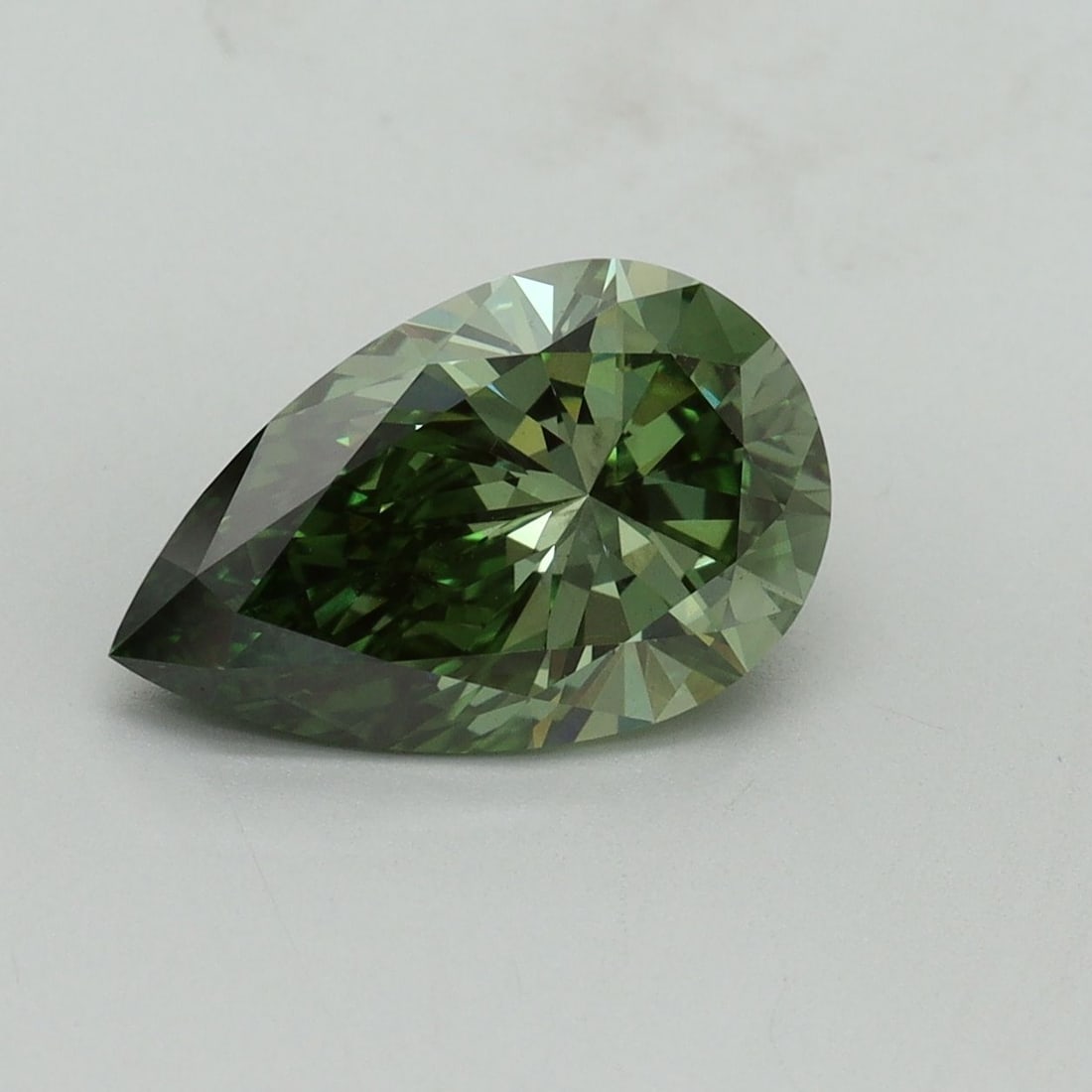 Loose Diamond - PEAR 2.12ct Fancy Vivid Green VS1: Loose Diamond - PEAR 2.12ct Fancy Vivid Green VS1 Source: This is a real non-mined Diamond that has been grown in a lab Shape: PEAR Carats: 2.12 Color: Fancy Vivid Green Certification: IGI Video: