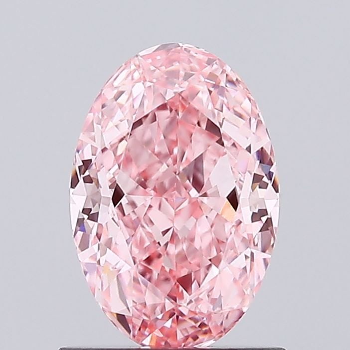 Loose Diamond - OVAL 1.03ct Fancy Vivid Pink VVS2: Loose Diamond - OVAL 1.03ct Fancy Vivid Pink VVS2 Source: This is a real non-mined Diamond that has been grown in a lab Shape: OVAL Carats: 1.03 Color: Fancy Vivid Pink Certification: IGI Video: