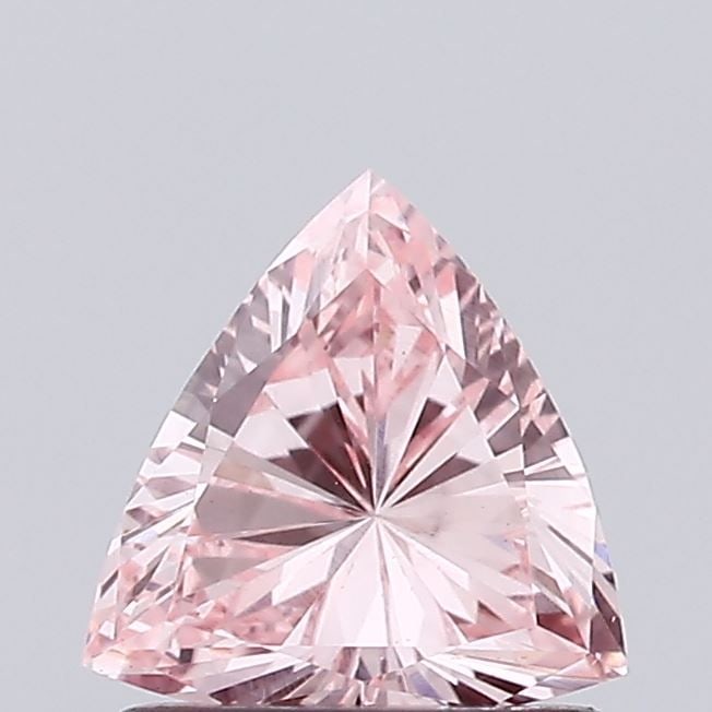 Loose Diamond - TRIANGULAR 0.79ct Fancy Vivid Pink VS1: Loose Diamond - TRIANGULAR 0.79ct Fancy Vivid Pink VS1 Source: This is a real non-mined Diamond that has been grown in a lab Shape: TRIANGULAR Carats: 0.79 Color: Fancy Vivid Pink Certification: NONE 