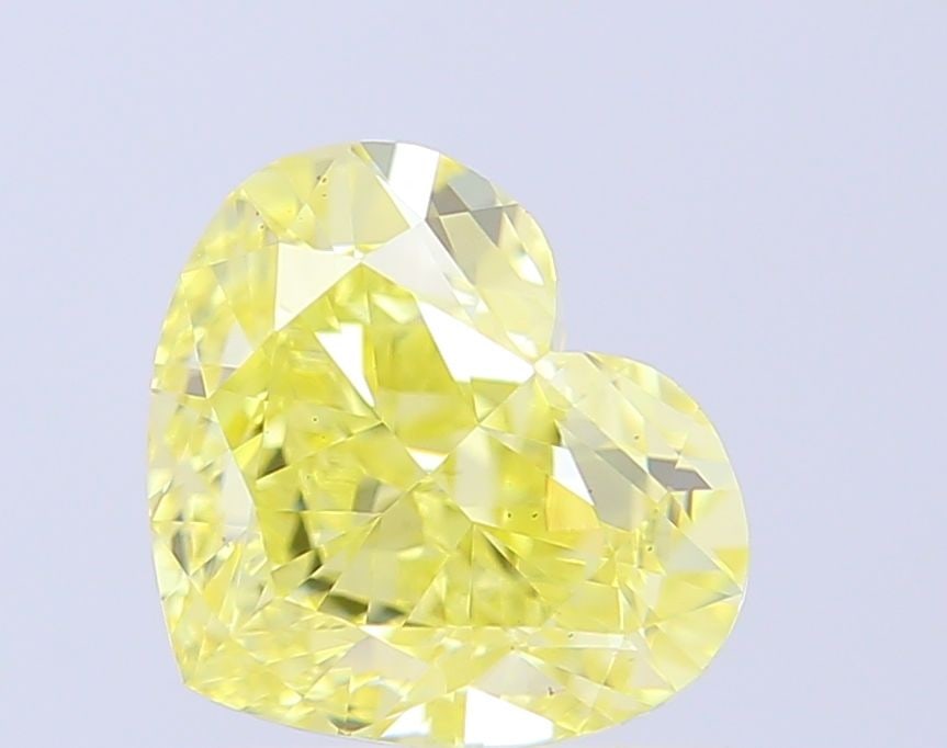 Loose Diamond - HEART 2.01ct Fancy Yellow VS1: Loose Diamond - HEART 2.01ct Fancy Yellow VS1 Source: This is a real non-mined Diamond that has been grown in a lab Shape: HEART Carats: 2.01 Color: Fancy Yellow Certification: IGI Video: