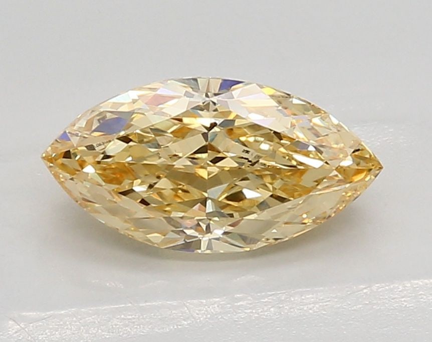 Loose Diamond - MARQUISE 1.51ct Fancy Vivid Yellow VS1: Loose Diamond - MARQUISE 1.51ct Fancy Vivid Yellow VS1 Source: This is a real non-mined Diamond that has been grown in a lab Shape: MARQUISE Carats: 1.51 Color: Fancy Vivid Yellow Certification: IGI V