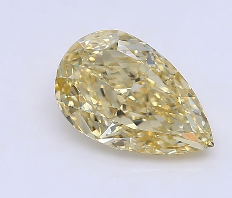 Loose Diamond - PEAR 0.92ct Fancy Intense Yellow VVS2: Loose Diamond - PEAR 0.92ct Fancy Intense Yellow VVS2 Source: This is a real non-mined Diamond that has been grown in a lab Shape: PEAR Carats: 0.92 Color: Fancy Intense Yellow Certification: IGI