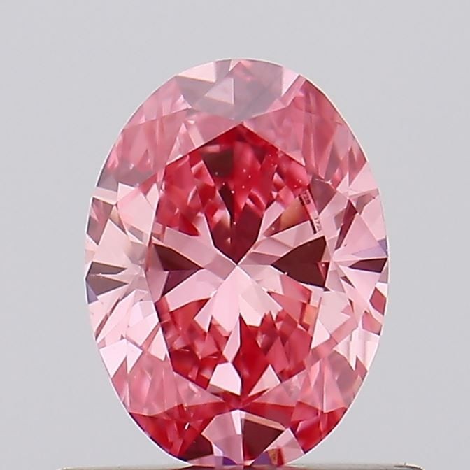 Loose Diamond - OVAL 0.56ct Fancy Vivid Pink VS2: Loose Diamond - OVAL 0.56ct Fancy Vivid Pink VS2 Source: This is a real non-mined Diamond that has been grown in a lab Shape: OVAL Carats: 0.56 Color: Fancy Vivid Pink Certification: IGI Video: