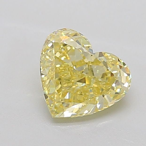 Loose Diamond - HEART 1.44ct Fancy Yellow VS1: Loose Diamond - HEART 1.44ct Fancy Yellow VS1 Source: This is a real non-mined Diamond that has been grown in a lab Shape: HEART Carats: 1.44 Color: Fancy Yellow Certification: IGI Video: