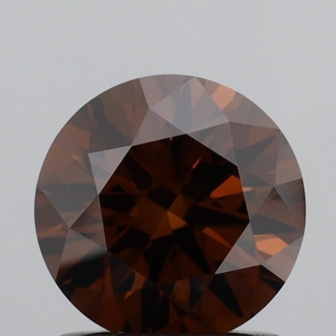 Loose Diamond - ROUND 1.01ct Fancy Deep Orangey Brown VS1: Loose Diamond - ROUND 1.01ct Fancy Deep Orangey Brown VS1 Source: This is a real non-mined Diamond that has been grown in a lab Shape: ROUND Carats: 1.01 Color: Fancy Deep Orangey Brown Certification: