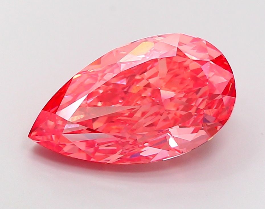 Loose Diamond - PEAR 6.35ct Fancy Vivid Orangey Pink VVS2: Loose Diamond - PEAR 6.35ct Fancy Vivid Orangey Pink VVS2 Source: This is a real non-mined Diamond that has been grown in a lab Shape: PEAR Carats: 6.35 Color: Fancy Vivid Orangey Pink Certification: 