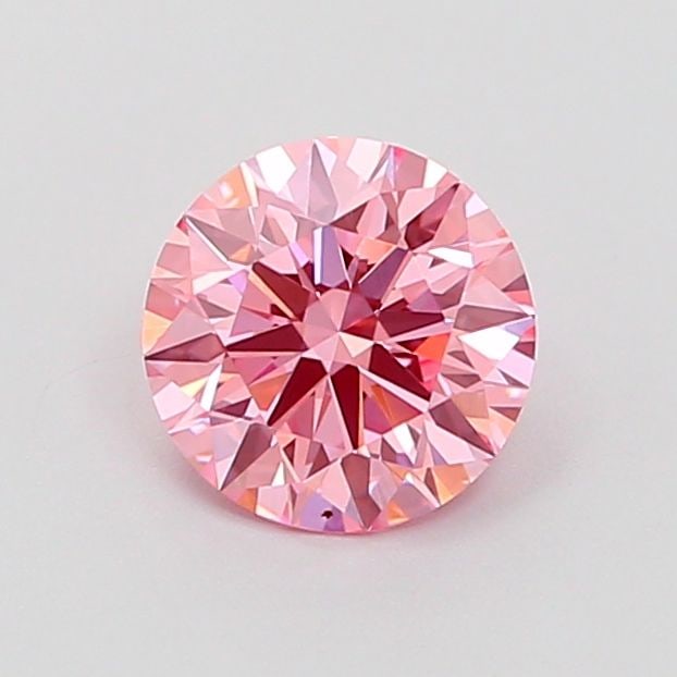 Ideal Loose Diamond - ROUND 0.64ct Fancy Vivid Pink VVS2: Ideal Loose Diamond - ROUND 0.64ct Fancy Vivid Pink VVS2 Source: This is a real non-mined Diamond that has been grown in a lab Shape: ROUND Carats: 0.64 Color: Fancy Vivid Pink Certification: IGI Vide