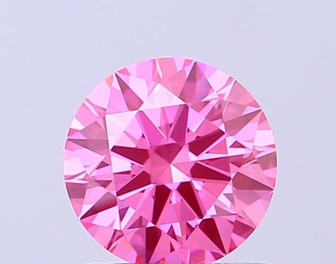 Ideal Loose Diamond - ROUND 0.73ct Fancy Vivid Pink VVS2: Ideal Loose Diamond - ROUND 0.73ct Fancy Vivid Pink VVS2 Source: This is a real non-mined Diamond that has been grown in a lab Shape: ROUND Carats: 0.73 Color: Fancy Vivid Pink Certification: IGI Vide